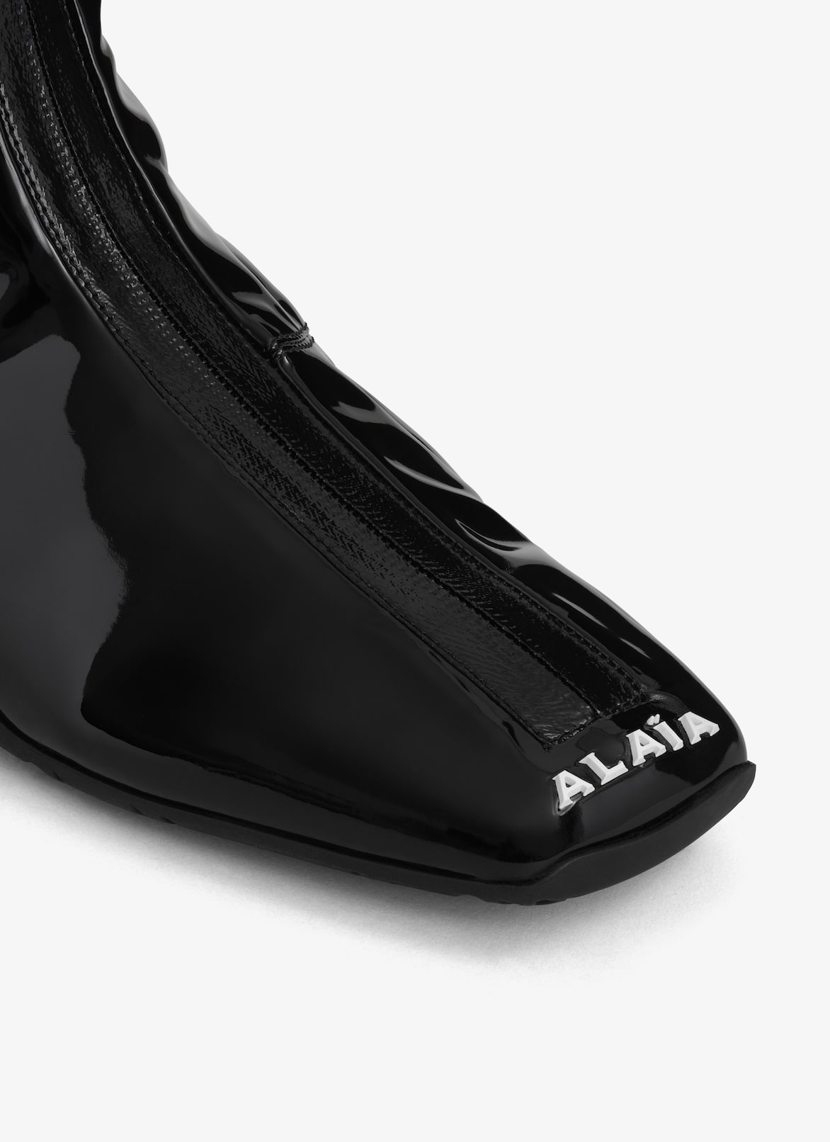 LA SNEAKER IN STRETCH PATENT FABRIC ALAÏA BLACK LA SNEAKER IN STRETCH PATENT FABRIC